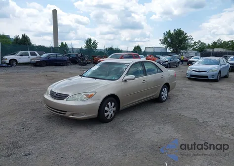 2003 Toyota Camry Le из США, поврежденный, VIN JTDBE32K930230439